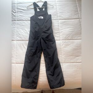 Northface YM EZ Grow ski bibs. Black.